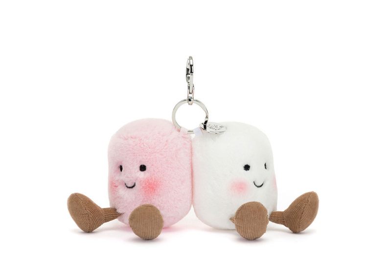 Two plush marshmallow characters with a keychain on a white background
