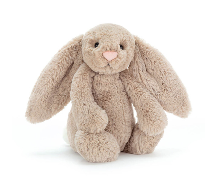 Plush bunny toy on a white background