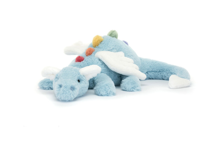 Blue plush toy dragon with colorful accents on a white background