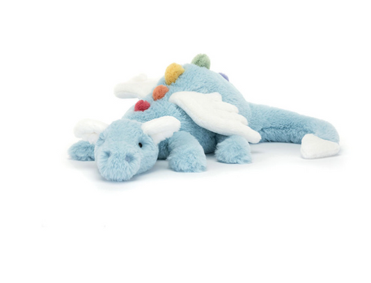 Blue plush toy dragon with colorful accents on a white background