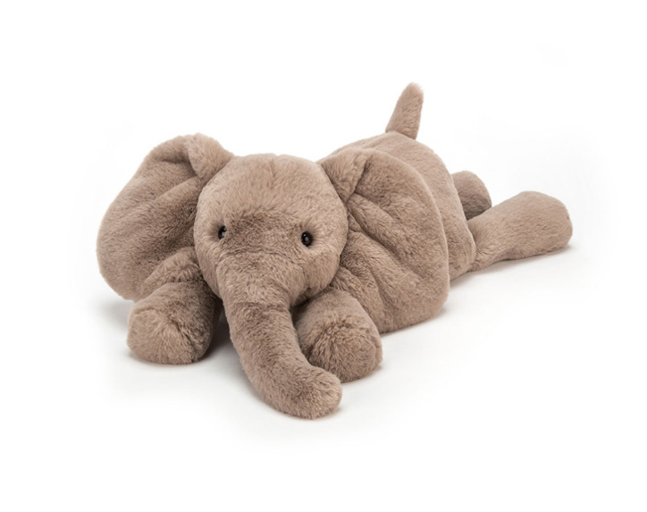 Plush elephant toy on a white background