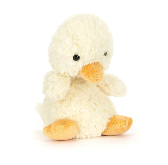 Plush duck toy on a white background
