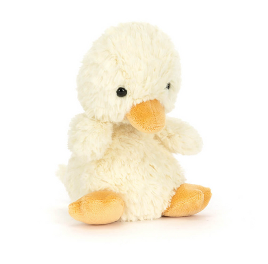 Plush duck toy on a white background